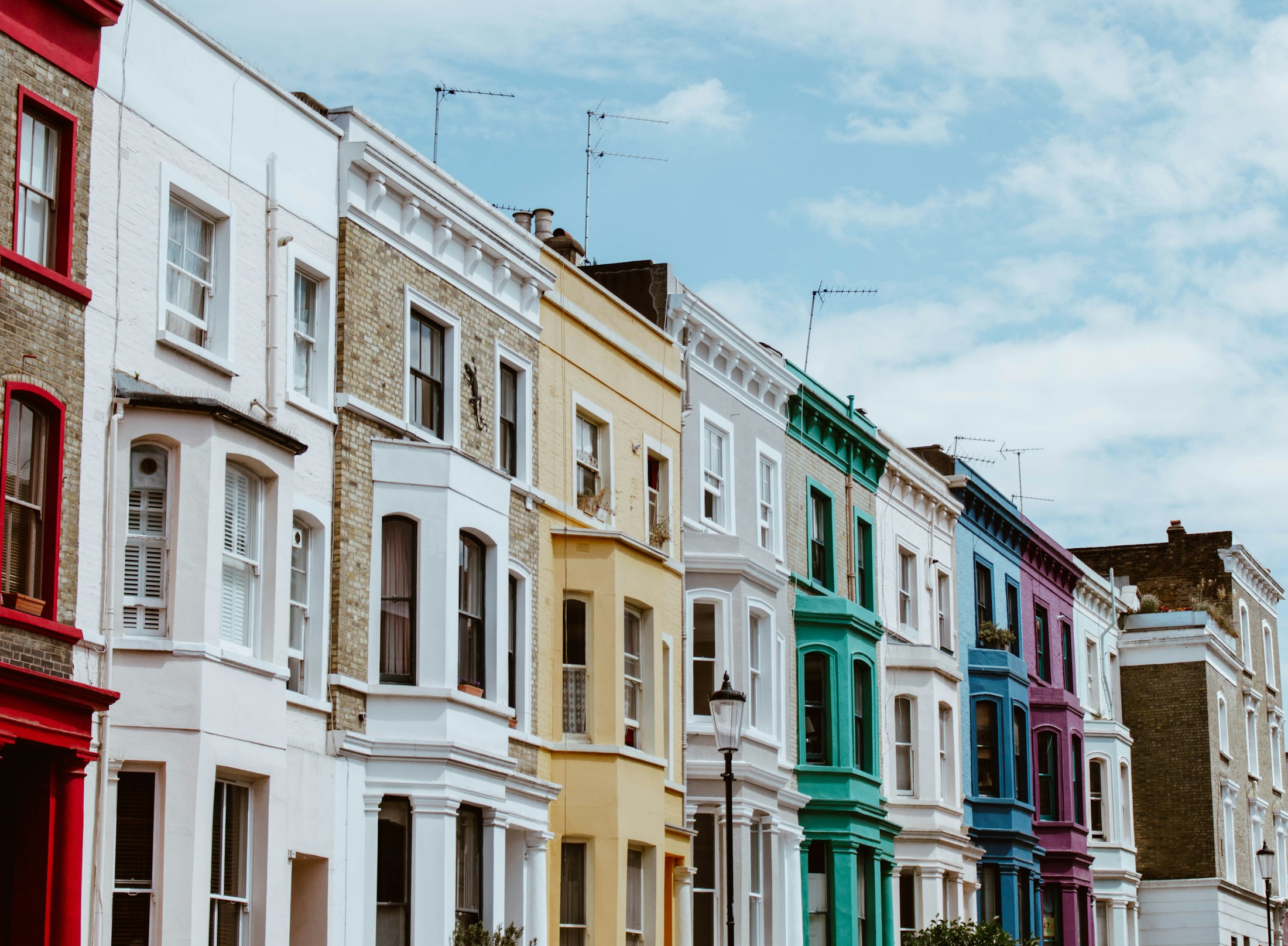 A row of traditional terraced homes in London